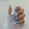 Faux ongles faits à la main réutilisables faux ongles presse sur les ongles ongles artificiels portables avec des yeux maléfiques Design couleur bleue couverture complète pointe longue Q240122