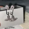Viviennes Westwoods Full Diamond Pins Boucles d'oreilles longues Femmes Femmes Planet Planet Clips Paper Moucles d'oreilles Matching Version High Edition