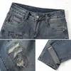 Kvinnors jeans med hål broderade höga midja s fickor byxor trasiga byxor för kvinna rippad blå byxa i grunge y2k a