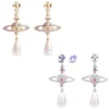 Viviennes Westwoods the pale pink paint water droplets pearl earrings elegant earrings