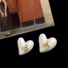 Viviennes Westwoods Heart shaped Pearl Earrings Female 925 Silver Needle Exaggerated Fashion Earrings Female