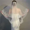 Bröllopslöja armbågslängd två lager spetsblommor applikation sequined vit elfenben utsökt brudslöjor med kam