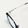 Optiska glasögon för män Kvinnor Retro Designer NPM 117 Fashion Titanium Glasses Frame Detaljerad elasticitet Oval Style Anti-Blue Light Lens Plate with Box