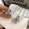 Viviennes Westwoods Bow Zircon Earrings 여성의 가벼운 고급 감각 디자인 달콤한 기질 맞춤형 귀걸이 귀걸이