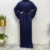 Etniska kläder Europeiska och amerikanska fashionabla muslimska kvinnor med veckade lösa blossade ärmar Runda halsklänning Lång kjol