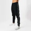 Pantalon d'exercice musculaire pour hommes frères coton fitness avec deux barres leggings de course pour jeunes 555 pantalons de survêtement 43554