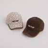 Gorras de bola Venta al por mayor Niños coreanos Otoño e invierno Gorra de béisbol de pana 2024 Niños Niñas Multi letra impresa 50-53 cm