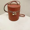 Cowhide Cylinder Bag Smple och Retro Bucket Bag Spring Women's Bag Single Crossbody Handväska