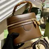 Kvinnor Totes Designer Makeup Bag Luxury Vintage Bucket Bags Högkvalitativ äkta läder Bambu påsar Trendiga avslappnade gyllene bokstäver Handväskor plånböcker