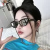 Okulary przeciwsłoneczne internetowe gwiazdy Cat Eye Okulasy dla kobiet o wysokim wyczuciu i odpornym na UV gwiazdy spersonalizowane fotografia uliczna. Mała rama modna