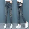 Jeans da donna con fori ricamati a vita alta tasche a S pantaloni pantaloni strappati per donna pantaloni blu strappati in grunge Y2k A