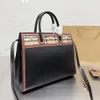 Kvinnors svart handtag tre nitar tygväska enkel axelpåsar handväska äkta läder messenger handväska högkapacitet254f