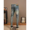 Jeans pour hommes Marque de mode Pantalon mince Imitation Old Stretch Patch Broderie Lavage pour faire du denim décontracté