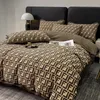 set di biancheria da letto set consolatore di design biancheria da letto Copripiumino autunnale e invernale in quattro pezzi di lusso semplice e leggero