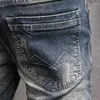 Herr jeans ly designer mode män retro mörkblå elastisk smal fit rippade byxor vintage casual denim byxor hombre