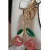 Porte-clés cerise, breloque de sac, accessoire de décoration, rose vert, design de luxe de haute qualité, 240122