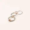 Designer Spinelli RNG Multi Ring Połączenie Trzy kolorowe splicing trzy pierścień tytanowe stalowe galwaniowane z 18 -karatowym złotym złotem