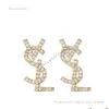 Designer smycken örhänge 18k guldpläterad österrikisk kristall bokstäver logotypen örhängen för kvinnor europeiska och USA populära enkla designerörhängen