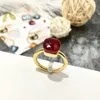 Anillos de banda Versión de cabeza de hongo simple Moda Estilo de corte irregular Brillante Imitación Cristal Esmeralda Anillo para hombres y mujeres Umgr