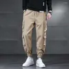 Мужские брюки, мужские японские уличные брюки-карго с несколькими карманами, мужские модные повседневные джоггеры в стиле хип-хоп, свободные гаремы больших размеров для мужчин 5XL