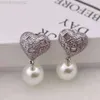 Orecchini Miui Miui del designer Miao Jia 21 nuovi orecchini di perle a forma di cuore di cristallo rosa con sentimento e temperamento di alta qualità Orecchini geometrici a cuore con diamanti rosa