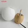 Desk Lamps Nordic Wood table lamp milk white glass ball decor Bedroom bedside lamp Study Children's eye protection warm LED desk lamp YQ240123