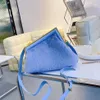 Designer Hairbags Clutch Bag Metal Hemming äkta ledare New Fashion Women Handväskor Damer Single Shoulder Messenger256R