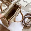 Väska mini linne tote woody canvas designer crossbody väskor kvinnor s designers små totes shoppare handväska kors body band brown216d s s mall s hopper