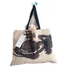 Viviennes Westwoods tuval çanta kadın moda tek omuz alışveriş çantası çevre koruma çanta satürn baskı moda etiketi