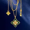 Projektant biżuterii Naszyjniki wisiorka koniczyna dla kobiet złoty słodki liść kwiat elegancki urok kryształowy diament z pudełkiem oryginalna jakość