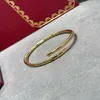 Bracciale rigido per unghie in acciaio al titanio di design di lusso Braccialetti con polsini a vite con diamanti Donna Uomo Gioielli di marca per il regalo della festa nuziale Alta qualità
