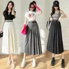 Jupes dames élégantes mode grand ourlet plissé longue jupe noire femmes vêtements filles coréen Chic décontracté Faldas Largas Py9133