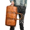 ダッフェルバッグ高級デザイン本物の革の男性旅行ビンテージ大容量荷物荷物男性週末のハンドバッグトート肩