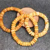 Armbanden original Baltic Sea Natural Amber Beeswax Armband för kvinnor Elastiska justerbara hjulavståndskonformabla bärnstenar