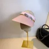 Sombreros de ala ancha Sombrero de sol de verano Diseñador femenino Industria pesada Agua Diamante Hebilla Cadena Multi Color Vacío Top Playa Sombrilla