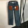 Designer-Jeans für Damen, lange, hohe Taille, Straße, ausgehöhlte Ledertasche, lässige blaue gerade Denim-Hose