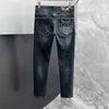 Jeans da uomo Designer fnedi jeans neri Prodotti europei di tendenza di fascia alta per l'autunno e l'inverno Pantaloni in denim a gamba piccola blu slim fit da uomo Little Monster MWIS