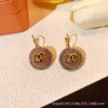 Designer channellies Minimalist coffee colored round letter earrings temperament earrings high-end earrings