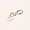 Designer Spinelli Rng Anello a quattro anelli con giunzione a tre colori con placcatura in acciaio al titanio ad incastro in oro reale 18 carati