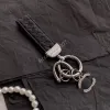 Desigenr jóias moda simples chaveiros preto tecer couro carro chaveiro unisex designer de aço inoxidável metal coração chaveiro saco pingente acessórios