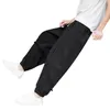 Pantalons pour hommes à la mode en coton et lin décontracté surdimensionné jambe large boutonné