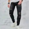 Mäns jeans män streetwear rippade massiva mager blyertsbyxor manliga snygga hål oroliga smala denim byxor