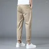 Herrbyxor sträcker avslappnade män smala fit lätta raka byxor sommar snabb torr sport joggers knapp ner solid khaki