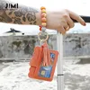 Keychains Fashion Jewelry Women Silicone Bead Pu Armband Card Wallet Holder Keychain Tassel Armband Key Chain