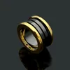 luxe ontwerper 18k gouden veerring roestvrij staal zilver roségoud mode-ring voor liefhebbers wit zwart keramiek paar ring voor vrouwen man sieraden cadeau