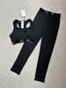 Modedesigner Yoga Workout Kit Sexig kvinnor Tracksuit Skär Halter Vest Slim Leggings med bröstkudden