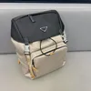 Bolsos de hombro doble de la mochila del diseñador para hombres bolsos escolares de nylon que viaja backs de triángulo 2 colores303x