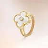 Ring Van-Clef Arpes Designer Luxe Mode Dames Goud Hoge Editie 18k Lucky Four Leaf Grass Series Ring Dames Vol Diamanten Agaat Natuurlijk Wit Schelpenring