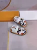 Sandales pour enfants populaires Logo en métal circulaire Pantoufles pour bébé Prix de revient Taille 26-35 Y compris la boîte Anti slip designer chaussures pour enfants Jan20