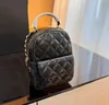 Marque française de luxe Designer femmes sac à mainNouveaux classiques mode diamant treillis chaîne sac à dos Double lettre haute qualité en cuir véritable Mini sac à dos